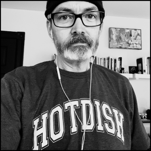 Kel Smith wearing a "hot dish" t-shirt